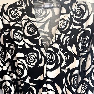 Darling black and white floral dress.  Tie waist.    Flattering.  Size XL.